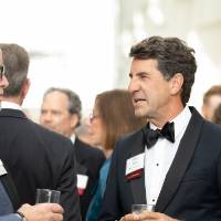 Guests chatting at Enrichment.